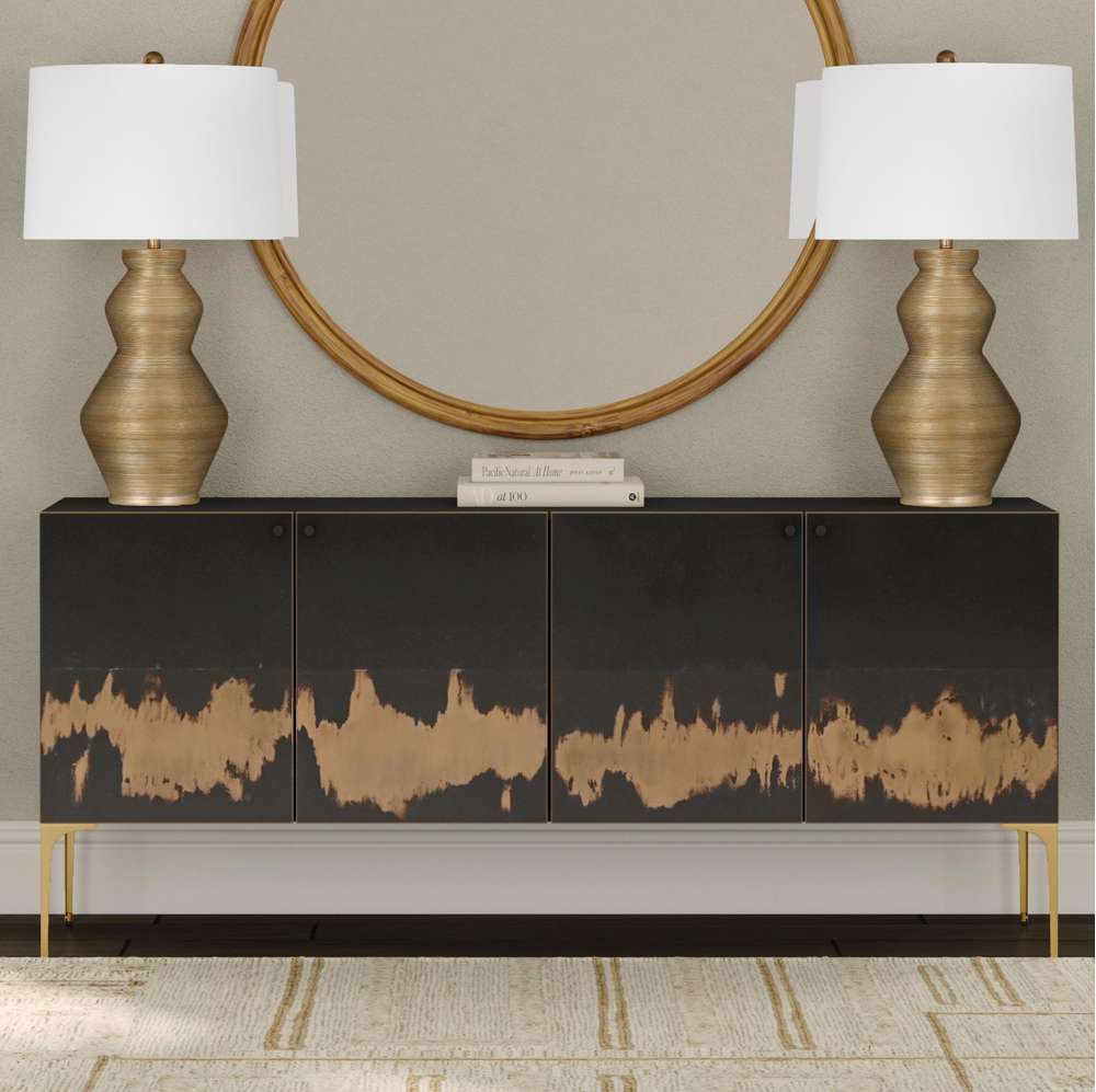 Bassett Mirror Company Kali Iron Sideboard features acid-washed doors and brushed gold legs, offering interior shelves with media cord management, all crafted from solid iron for modern luxe decor.