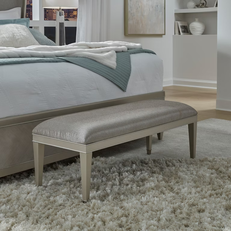 Zoey Vanity Upholstered Bed Bench with metallic gray upholstery, champagne-finished frame, and silver-finished ferrules on tapered legs. Modern design made from maple veneers and fabric, perfect for bedrooms, living rooms, or entryways.