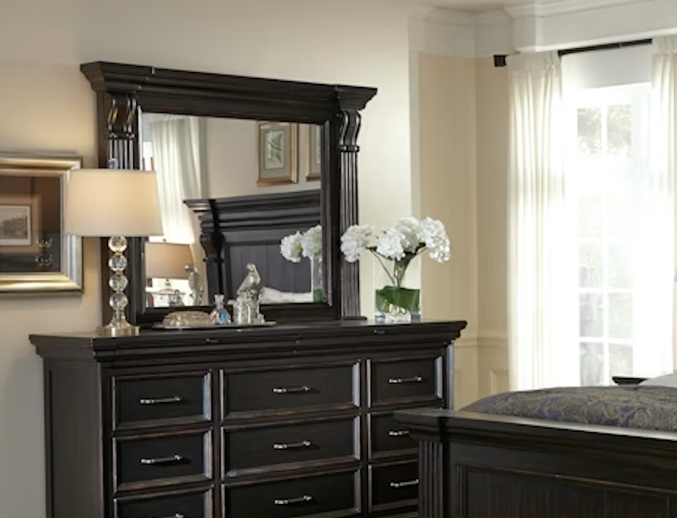 Pulaski Furniture Caldwell Mirror, featuring classic architectural styling with crown molding, pilasters, and corbels. Finished in dark brown espresso with gentle distressing for an heirloom quality look. Made with acacia veneers, this large beveled mirror complements the traditional/formal Caldwell bedroom collection.