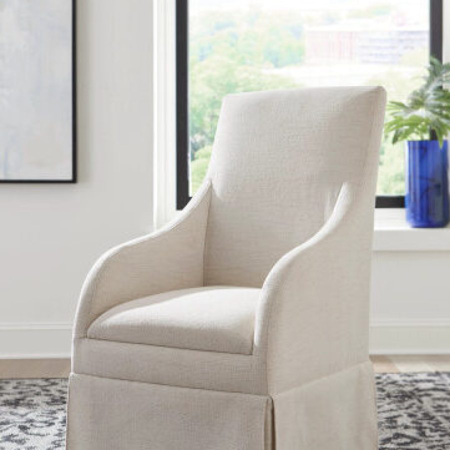 Hammary Annette dining chair from the Hidden Treasures collection. This fully upholstered chair features casters for easy mobility. Dimensions: 42H x 23.69W x 26.44D.