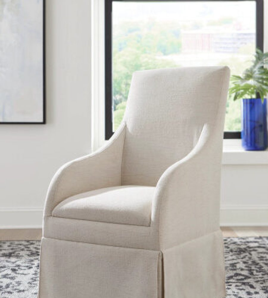 Hammary Annette dining chair from the Hidden Treasures collection. This fully upholstered chair features casters for easy mobility. Dimensions: 42H x 23.69W x 26.44D.