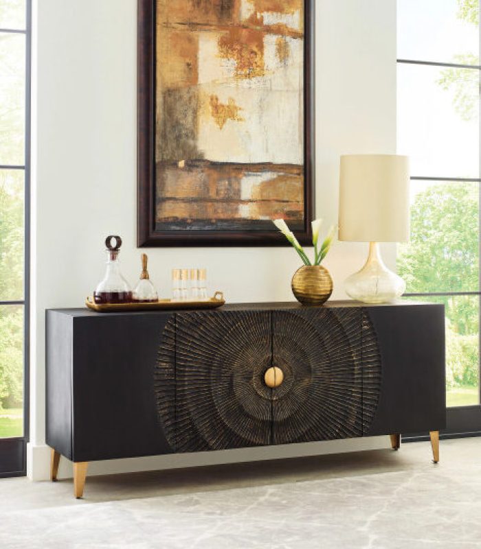 Hammary Centric Four-Door Sideboard made from mango wood with metal legs. Includes three adjustable shelves, wire management, and hand holds on the back for easy placement, combining style and functionality.