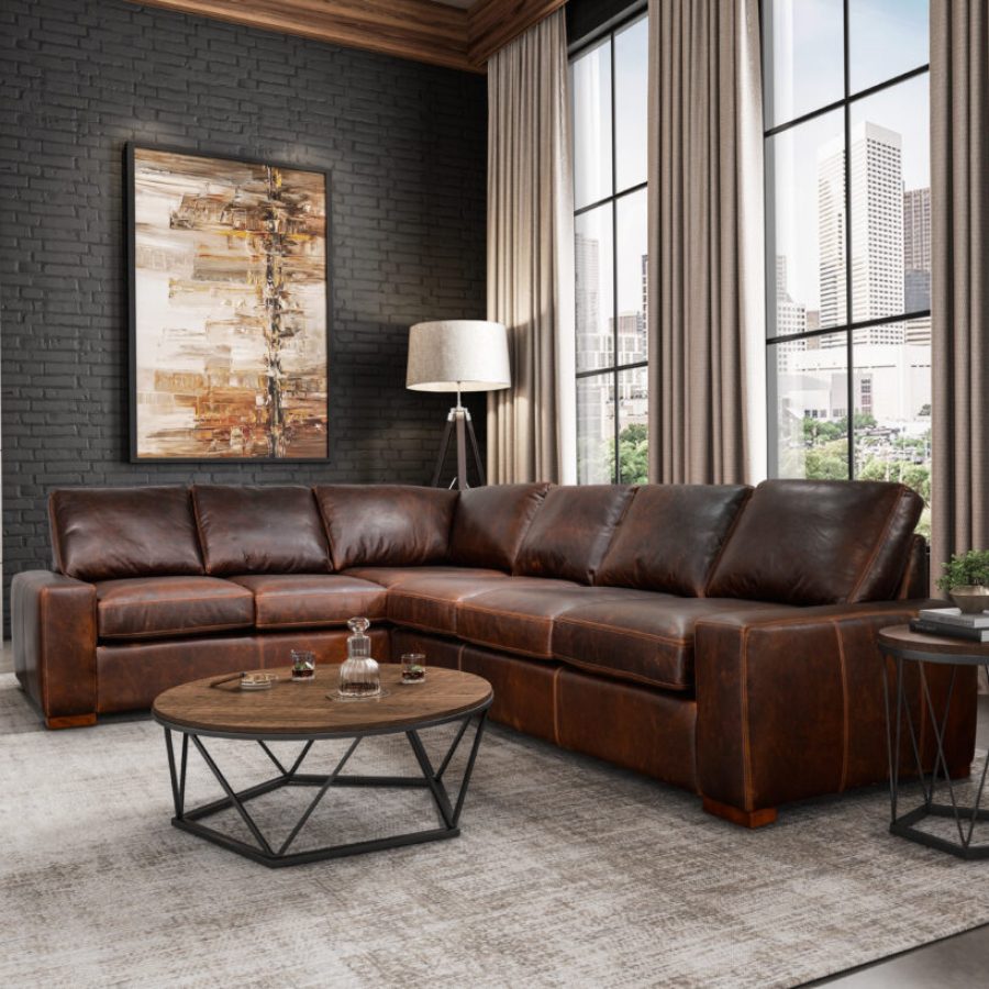 Spacious Omnia Leather sectional in a stylish living room, featuring premium handcrafted leather upholstery and customizable seating arrangements.