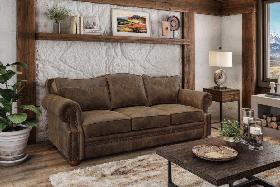 Elegant Omnia Leather sofa and loveseat set in a stylish living room, featuring premium handcrafted leather upholstery and luxurious comfort.