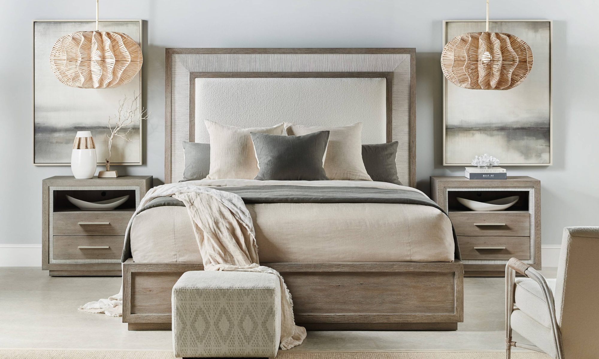 Beautiful neutral-toned bedroom with wood-accented bed, nightstands, and soft lighting, featuring cozy linens and modern décor.